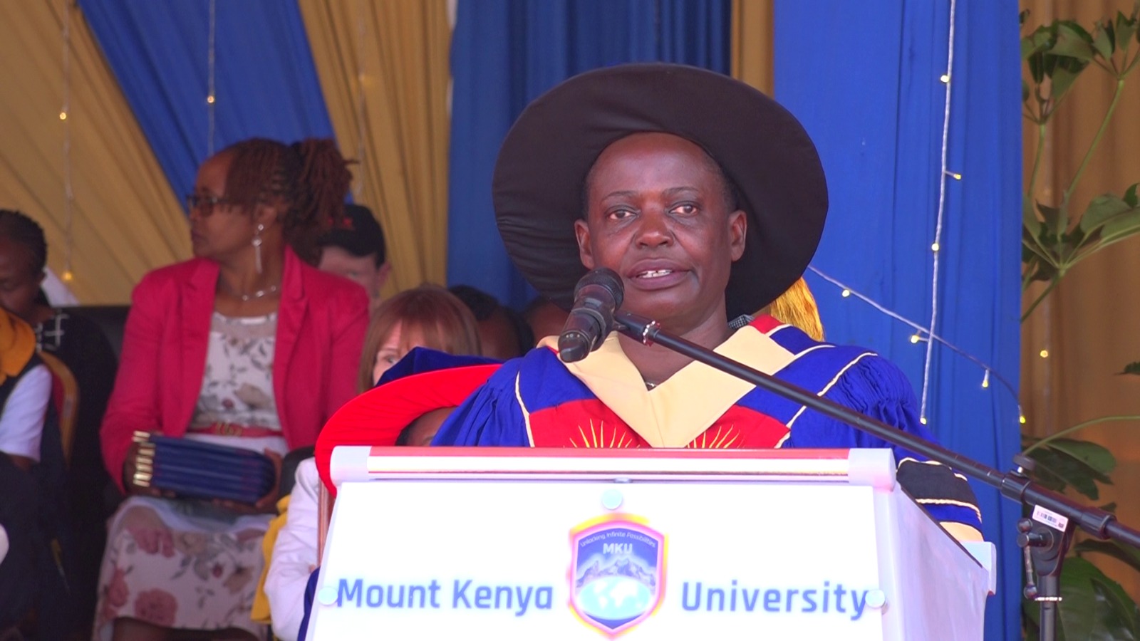 Amb. Eunice Kigenyi, Deputy High Commissioner, Uganda High Commission address graduands during MKU's 26th graduation ceremony